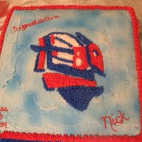 Graduation Cake They wanted his school mascot emblem on the main cake, then two other cakes, one representing his being in football, and one a record...