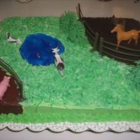 Barn Yard The mud is just chocolate icing and so is the dirt pile along with chocolate cake sprinkled on it. The water is piping gel that I colored...