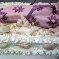 Flipflop Cake Chocolate cake with butter cream frosting. Flip flop is peanut butter cake and peanut butter frosting covered in fondant. Flowers are...