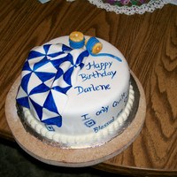 Quilt Cake I made this for my boss's friend who is a quilter. It was late when I got started on it and by 10:30pm my creativity had gone out the...