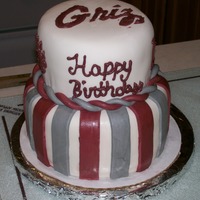 Montana Grizzlies Cake Everything about this cake I hate. It was a carrot cake with cream cheese under the fondant. My fondant was cracking, my stencil was too...