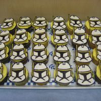 Star Wars / Clone Wars Clone Troopers Cupcakes I made this for my son's 6th birthday. The clone troopers are made out of Wilton candy melts. It was time consuming but worth...