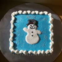 Snowman This was a 9" square with vanilla buttercream frosting. I made the snowman from royal icing.