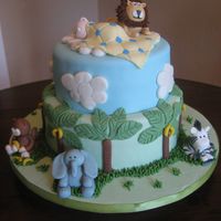 Jungle Baby Shower Cake This was a lot of firsts for me... first fondant figures, first fondant covered cake, and first stacked cake. Several different cakes on...