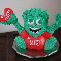 Green Monster Chocolate cake with orange buttercrem and MMF,made for Oliver who loves Manchester United...
