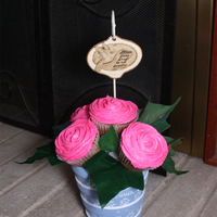 Pink Roses This was my very first cupcake bouquet. All and all I was pretty happy with the way it turned out. It was a gift for my mother. I used &...