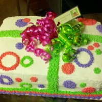 Present Cake Butter cream icing, real ribbons (not icing). A fun cake.