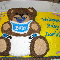 Bear Baby Shower Cake Bear shaped pan on top of a half sheet cake
