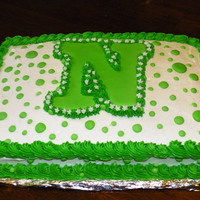 Going Away Cake This was for my cousin, he was off to collage! so i made him a going away cake, The N was for the collage and their color is Green, and i...