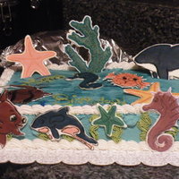 Fish World Birthday Cake I made this for my aunt, she loves that game on facebook, fishworld. so i made abunch of fish out of colorflow.