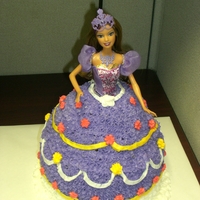 3-D Barbie Cake This is 4 layers, the third and fourth top layers are cut in to give her the dress.