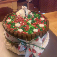 Snowman In A Candy Barrel Hungry snowman eating a piece of M&M (note crumbs on face). I made this for a candy fanatic! Butter Cake with bc frosting and bc and...