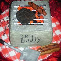 Bbq Cake I made this cake for my dad for fathers day 2009. I wanted to do something different .He loved it so did everyone else. Everything is...