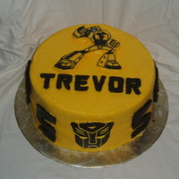 Transformers Bumblebee Bumblebee cake for a little boy's 5th birthday. Dark chocolate cake with Bavarian cream filling, and BC icing. Bumblebee and Autobot...
