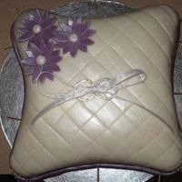 Ring Pillow Cake I made this for a friend's wedding shower. This was my first fondant cake and my first carved cake. Please excuse the tooth picks, I...