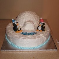 Penguins Fishing This was for a work Christmas party. The igloo and base are buttercream and the penguins were made with fondant and gum paste.