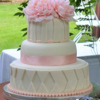 1St Wedding Cake This is a cake my friend and I made for her brother's wedding reception. Bottom tier is Styrofoam, middle and top tiers are WASC with...