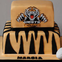 Wests Tigers Cake Aussie NRL team Wests Tigers 2 tiered cake.Banana cake with cream cheese frosting on the inside.Tasted amazing.