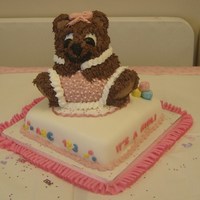Baby Bear This cake has a 10 inch square base, with the 3D bear pan on top. Bottom tier is covered and decorated in fondant, blocks are made of...