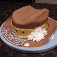 Howdy Pard'ner Cowgirl Hat Cake I made this instead of one of the cakes recommended for the final Wilton Fondant and Gumpaste class--way more fun!