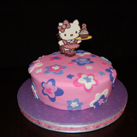 Rollerskating Hello Kitty Rollerskating Hello Kitty Birthday Cake for a friend's daughter who loves pink and purple (and Hello Kitty, of course) The party is at...