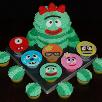 Yo Gabba Gabba Brobee made using 6" round cakes and 1/2 of the Wilton ball pan. Covered with buttercream icing and fondant facial details. Arms and...