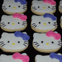 Hello Kitty Cookies Birthday Cookies for a friend's daughter who loves pink and purple (and Hello Kitty, of course) Made to go with a rollerskating Hello...