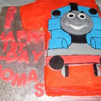 Thomas The Tank Engine This was the first attemp at a birthday cake and it was made for my son Thomas's first birthday. Thomas has been made out of fondant (...