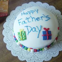 First Fondant Cake White cake with strawberry filling. This is my first Fondant Cake...Not bad...