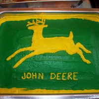 John Deere This is a half sheet cake that I did for my cousin's b-day. It's half choc/ half white with buttercream icing.