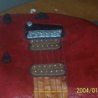 Guitar Cake Lifesize replica of bandleader's guitar...Boy was it hard to get that burgandy right!