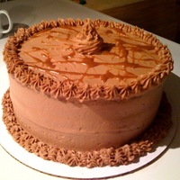 Peanut Butter Baba I threw this cake together the other night when the kids hit the sheets early! It is a butter yellow cake, with caramel soaked between...