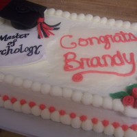 Graduation Cake This was done for a lady who finally finished school with a degree in psychology. Cap, degree and roses all done in fondant with...