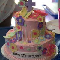 Flowers And Butterflies Cake 2 Tiered Flowers and butterflies cake. Bottom tier is 10" top tier is 6" both covered with pink buttercream. the decorations are...