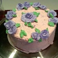 Purple Bc Roses chocolate fudge cake with butter cream frosting and bc roses
