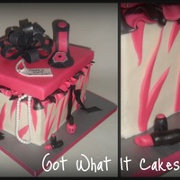 Girly Cake All things girly :) Gumpaste shoe and necklace, fondant lipstick, nail polish. All spilling out of a gift box :)