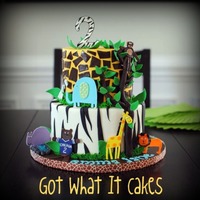 Zoo Cake This cake was for a 2 year old who was having a zoo themed birthday party. I matched the animals to the invitation, and added a bear with a...
