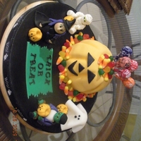 Trick Or Treat! This is the second cake I had to bake for this. The first one, I cut the grooves for the pumpkin WAY too deep and the whole cake basically...