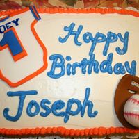 Baseball Cake I Baseball Cake for Baby's 1st Birthday. Parents were Mets fans, so we used their colors. Chocolate Cake with Fluffy Puff Vanilla Icing...