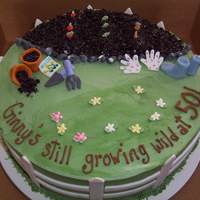 Garden Scene Buttercream frosting with BC vegetables. Fondant for all other decor.
