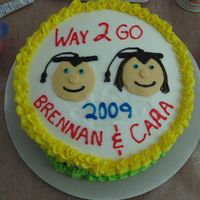 Brennan & Cara Graduate 6Th Grade A cake for my neice & nephew.....white cake with buttercream...nothing fancy...I'm only 3 months into this deal but loving it!