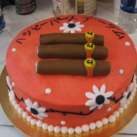 Going To Japan And Loves Cigars Made this for my friend Jim who is going to Japan, wrote 'Happy Birthday Jim' in Japanese and put some rolled fondant cigars...he...