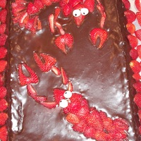 Strawberry Lobsters Chocolate cake covered with chocolate ganache with strawberries assembled into lobsters!Groom's cake. Couple's pet name for each...