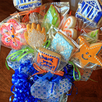 My First Cookie Bouquet Gran Marnier Sugar Cookies with company logo and thankyou in appreciation for their referrals.