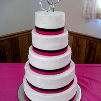 Hot Pink Wedding This cake was inspired by Fairytale's cake. All buttercream except for real ribbon used.