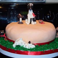 For The Dogs I did this for a groomer, every thing is done with fondant.