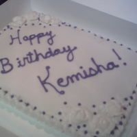 Birthday Cake White cake with buttercream frosting and decorations