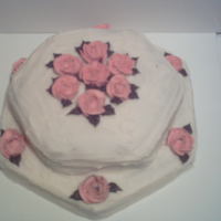 Mary's Birthday Italian cream cake with cream cheese icing. Pink roses and brown leaves are made of buttercream.