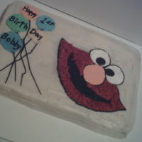 Elmo Red velvet cake with cream cheese frosting. Decorations are buttercream