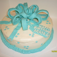 Mama's Birthday Carrot cake, cream cheese frosting. Decorations made of fondant